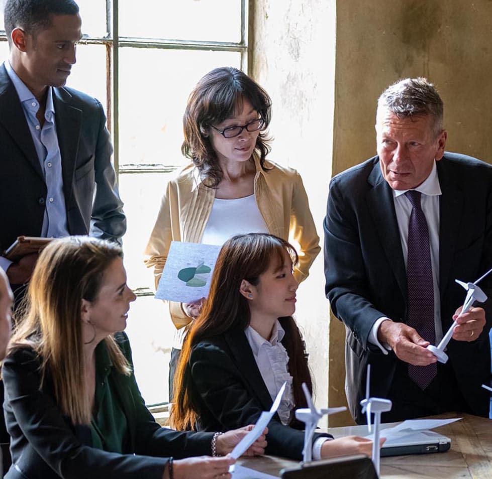 5 people meeting in an office
