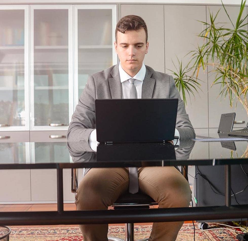 solicitor at computer desk