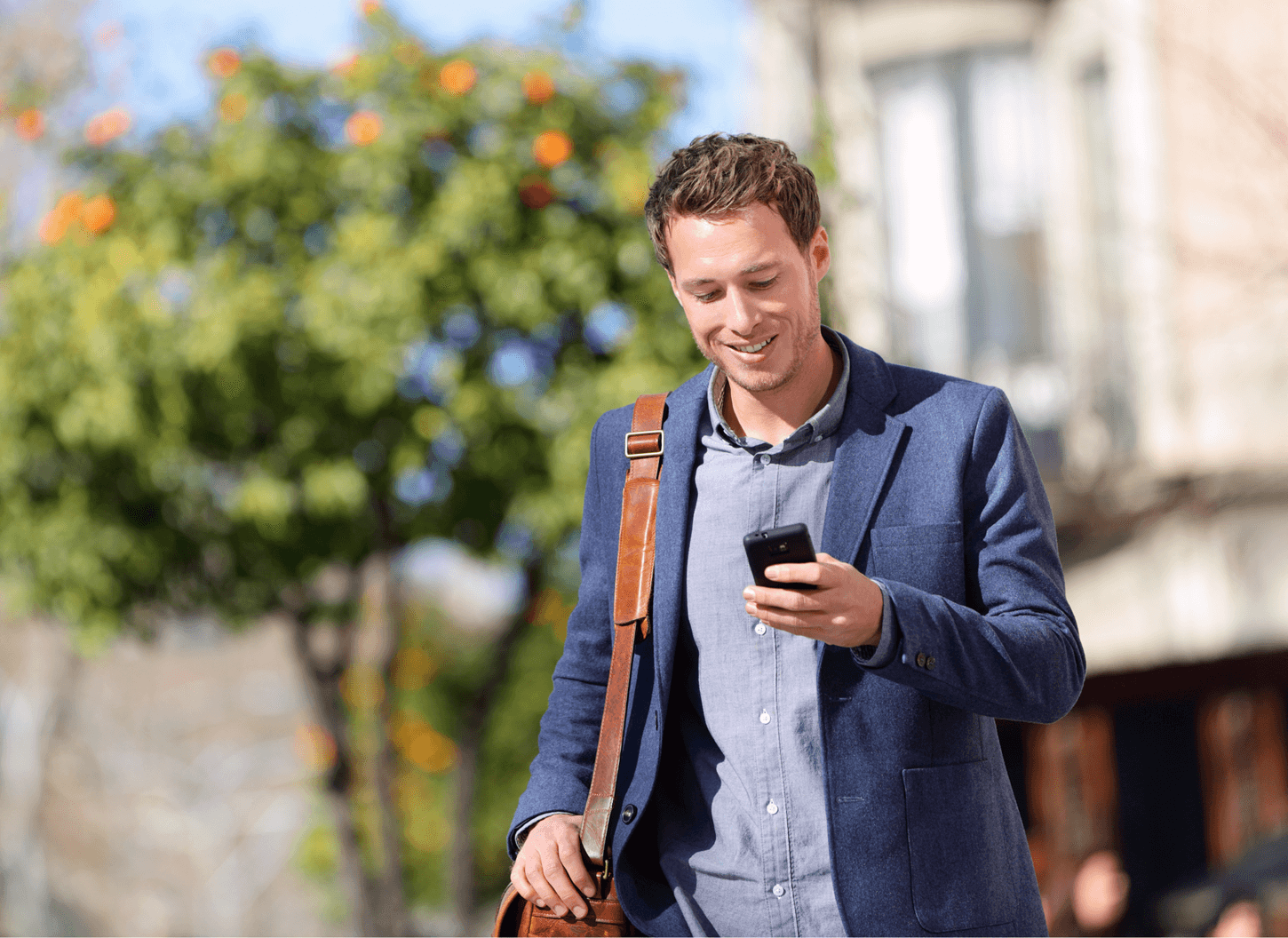 Solicitor walking with a phone in his hand