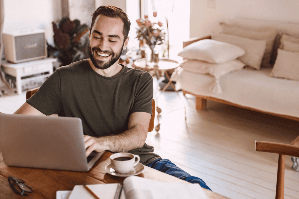 Man working on laptop at home
